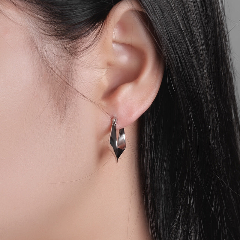 Boucles d'oreilles torsadées brillantes en argent sterling