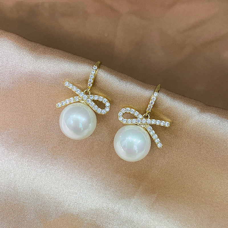 Bow zircon pearl earrings