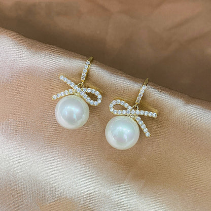 Bow zircon pearl earrings