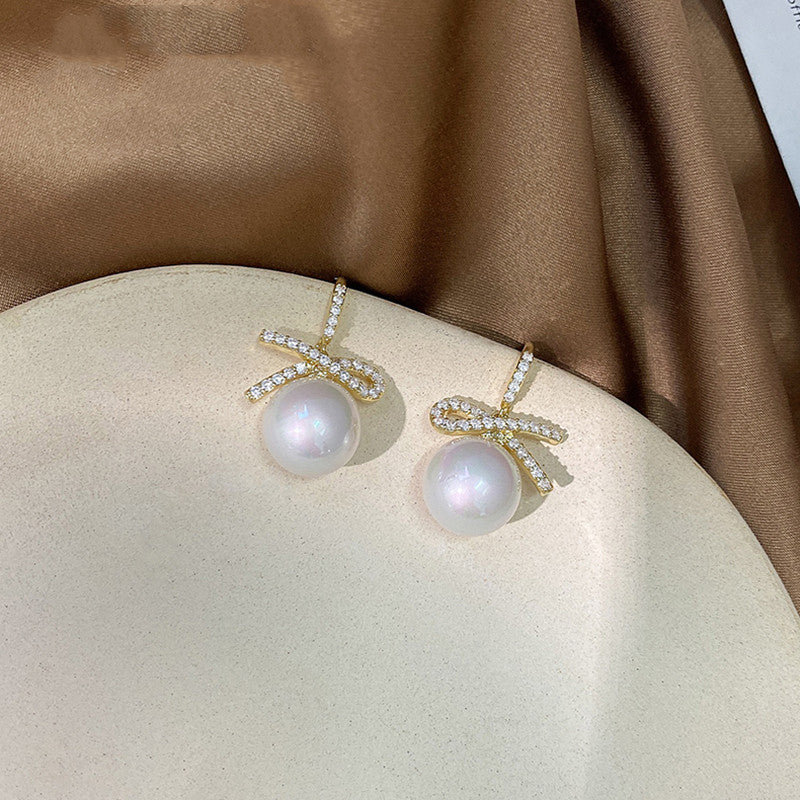 Bow zircon pearl earrings