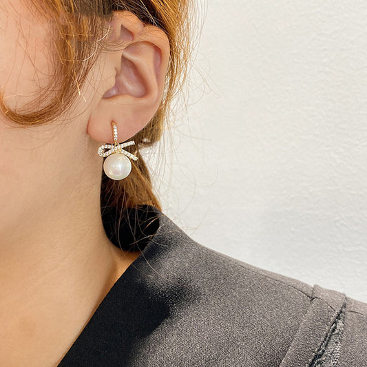 Bow zircon pearl earrings